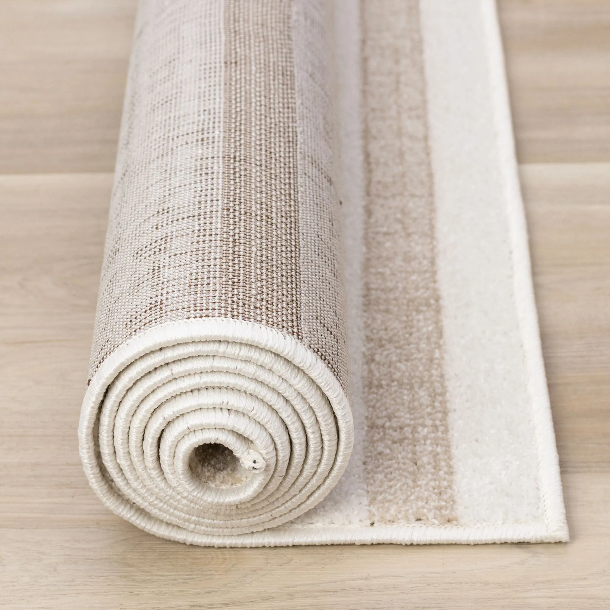 Beachwood Stripes 6'7" x 9'10" Striped Area Rug - Cream